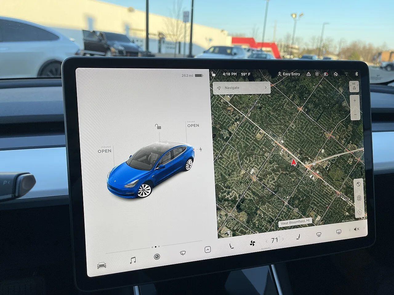 Tesla Model 3 center screen installing an over-the-air software update